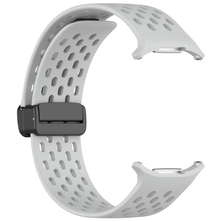 Light gray perforated silicone watch band with magnetic buckle and exposed connector ends