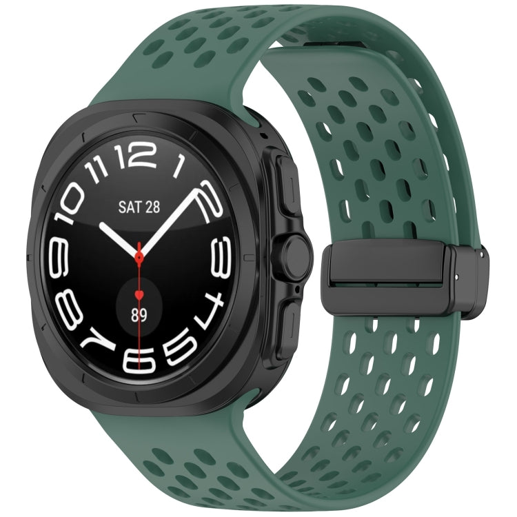 Dark green perforated silicone watch band with magnetic folding buckle, shown on a smartwatch