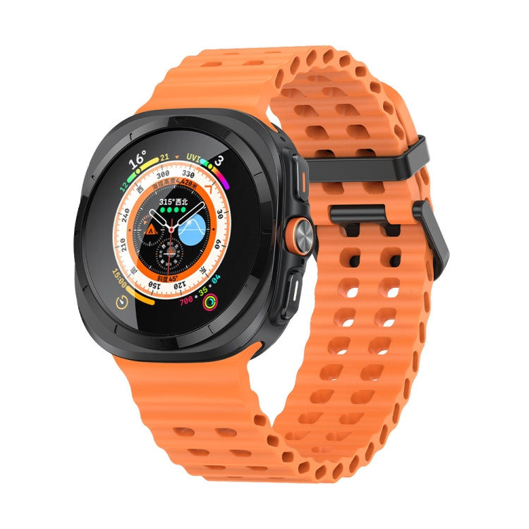 Orange silicone watch band with dual rows of holes, shown on a smartwatch