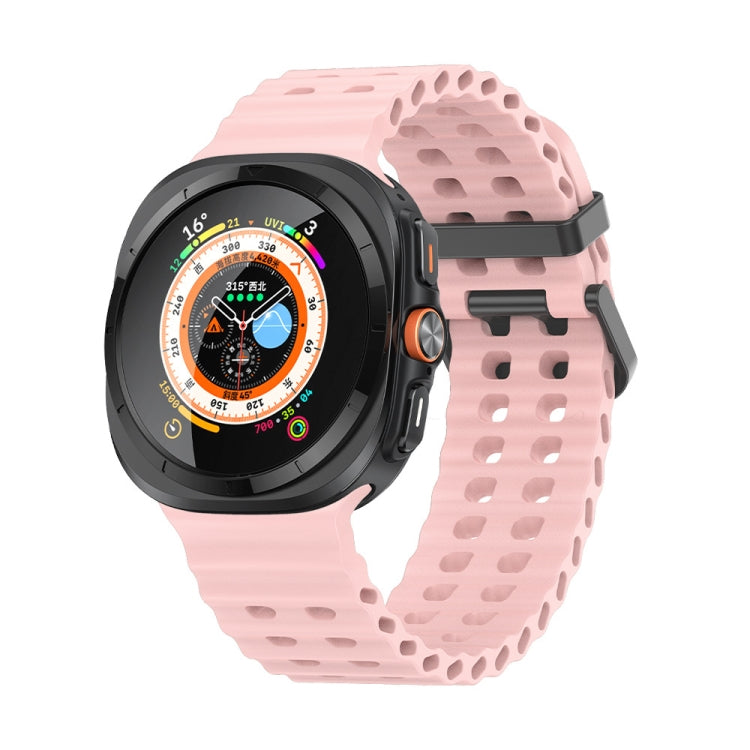 Pink silicone watch band with dual rows of holes, shown on a smartwatch