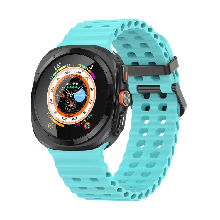 Teal silicone watch band with dual rows of holes, shown on a smartwatch