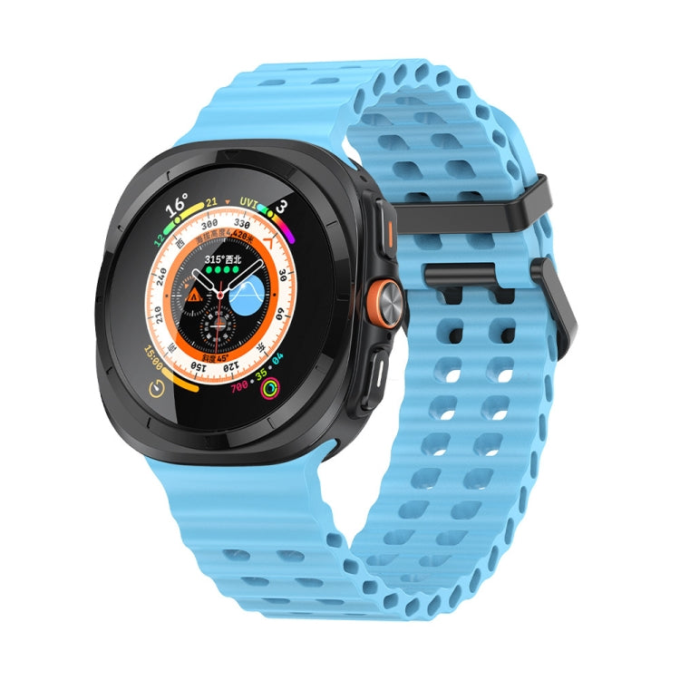 Light blue silicone watch band with dual rows of holes, shown on a smartwatch
