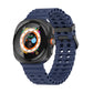 Dark blue silicone watch band with two rows of adjustment holes, fitted to a smartwatch.
