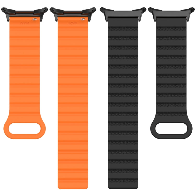 Two-tone silicone watch band set in orange and black, shown in long and short lengths