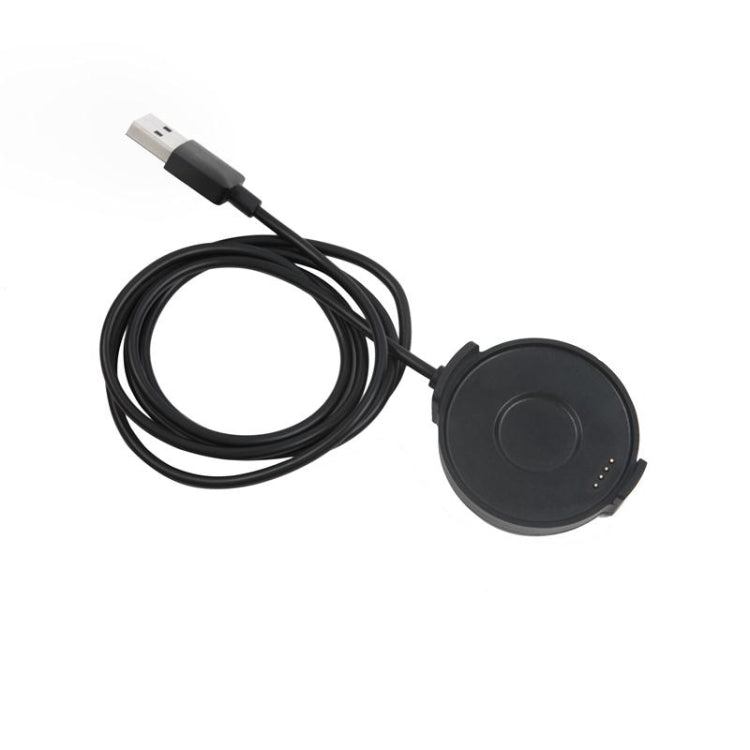 Black USB cable with magnetic charging puck, compact round design