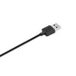 Black USB charging plug on cable, angled close-up