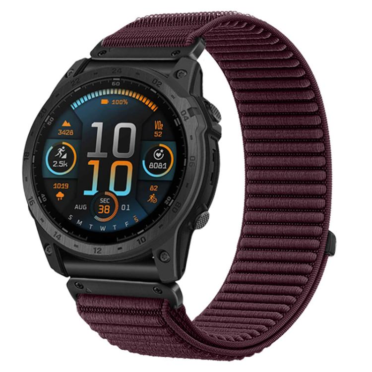 Garmin watch with a deep plum woven nylon hook-and-loop band.