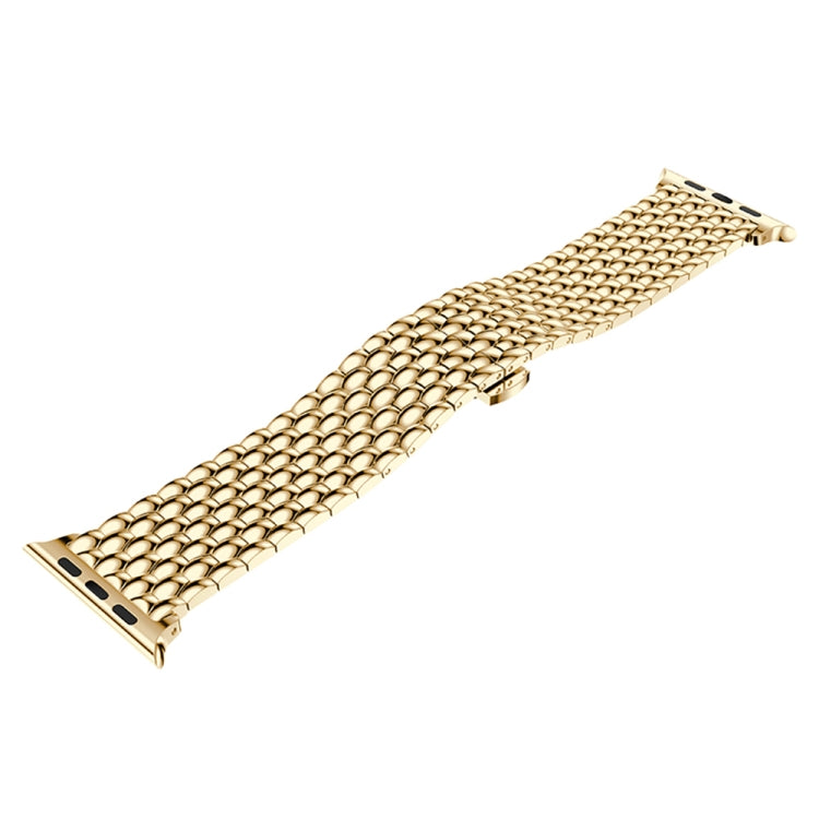Gold dragon-grain stainless steel Apple Watch wrist strap, band detail