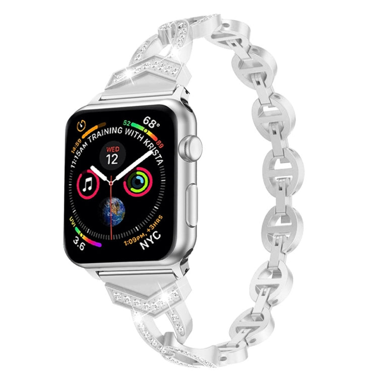 Silver 8-shaped link watch strap with diamond-studded panels and metal clasp