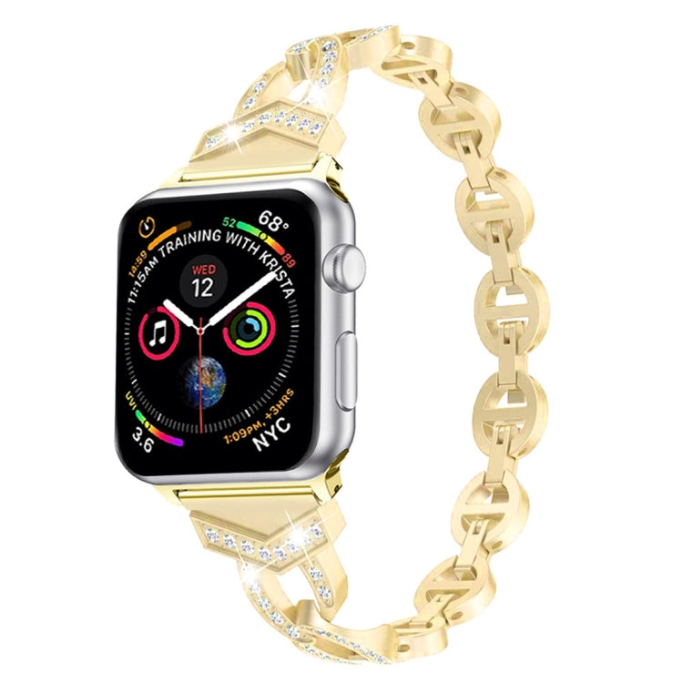 Gold 8-shaped link watch strap with diamond-studded panels and metal clasp