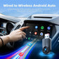 Car wireless adapter with blue LED ring, carbon-fiber housing near dashboard