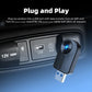 USB car adapter with blue LED ring, carbon-fiber housing plugged into port