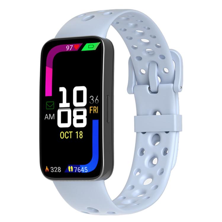 Light blue perforated silicone watch band with matching pin buckle on a fitness tracker