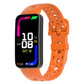 Orange perforated silicone watch band with matching pin buckle on a fitness tracker