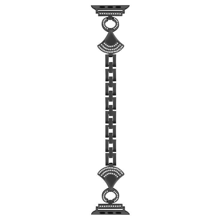 Black metal Apple Watch band shown extended, with linked strap and crystal-set ornamental ends