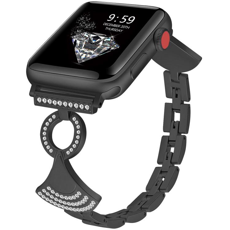 Black linked metal Apple Watch band with crystal accents on its ornamental clasp
