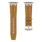 Pair of brown vegan leather watch band straps with silver connectors and buckle