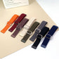 Assorted diagonal-stripe elastic watch bands laid out with D-ring buckles
