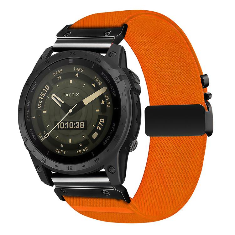 Orange diagonal-weave stretch nylon watch band with black buckle, shown on a watch