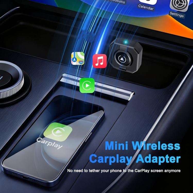 Wireless car adapter plugged into a car console near dashboard buttons