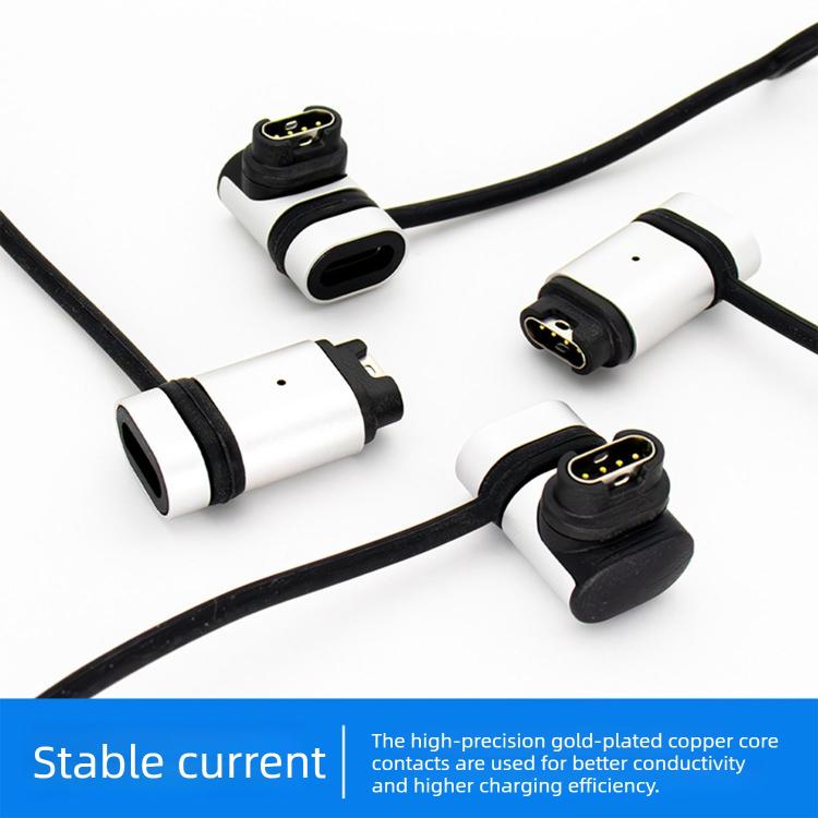 Garmin watch charging adapters with white metal housings, black ends, and attached cables.