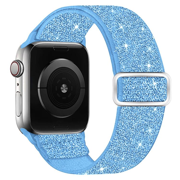 Light blue glitter elastic nylon watch band with silver-tone buckle, shown on a smartwatch