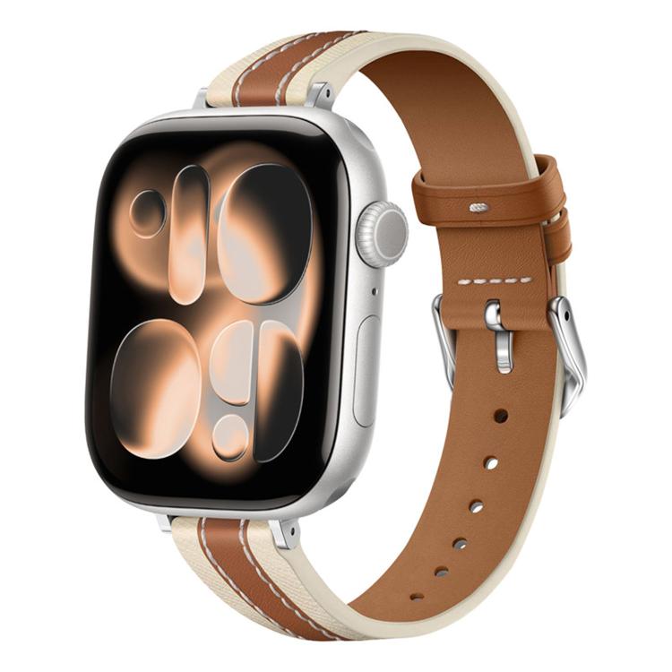 Saddle brown leather Apple Watch band with cream trim and silver buckle