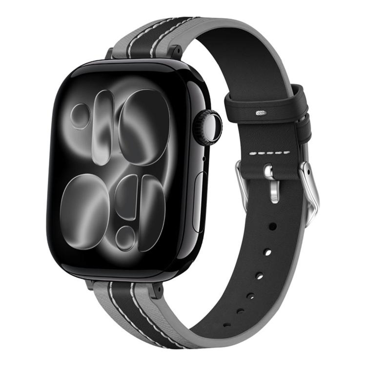 Black leather Apple Watch band with gray trim, contrast stitching, and silver buckle