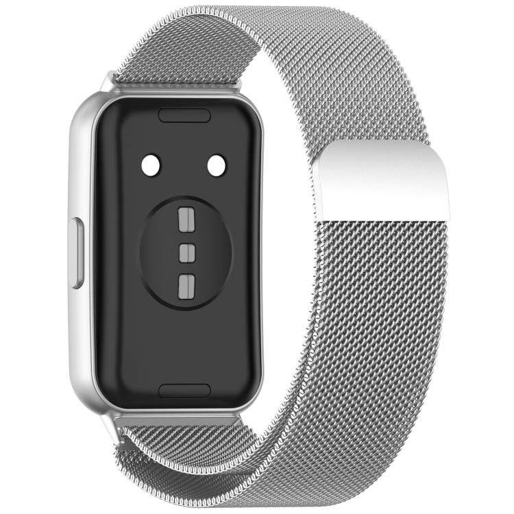 Silver magnetic metal watch band attached to a watch back
