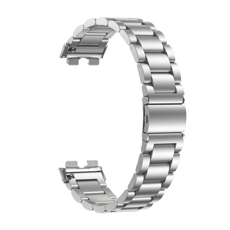 Detached silver three-bead stainless steel watch band with connector ends visible.