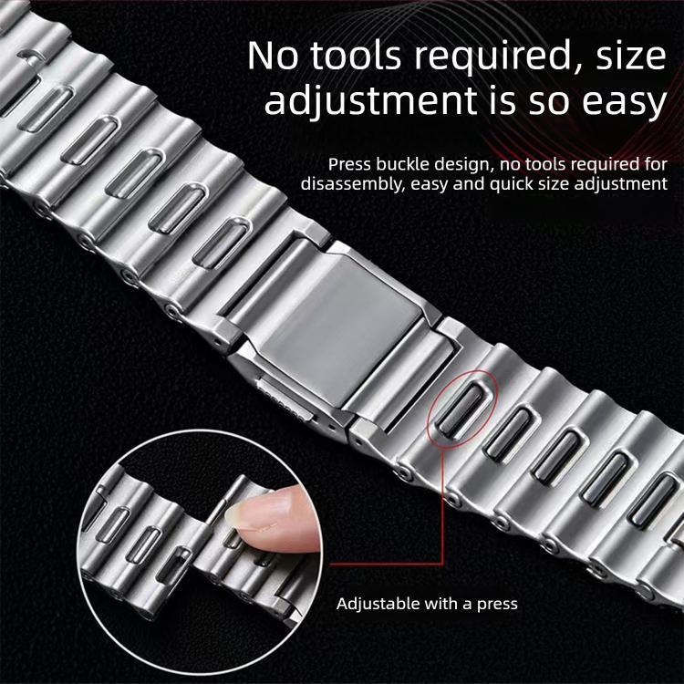 Silver stainless steel watch band with press-to-adjust links and a folding clasp