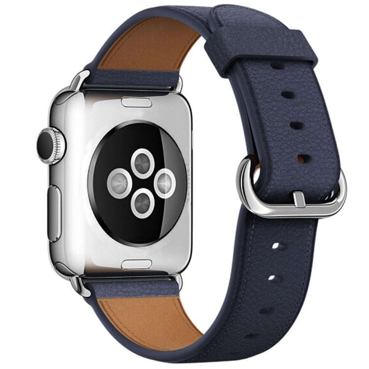 Blue leather watch band with silver buckle and tan underside, pin holes