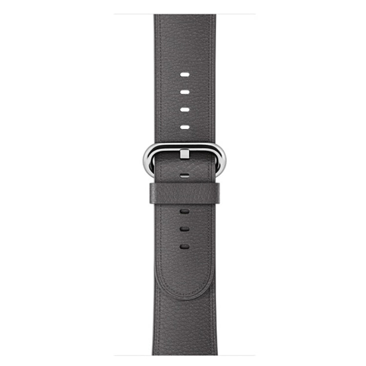 Gray leather watch band with silver buckle and pin holes on the strap