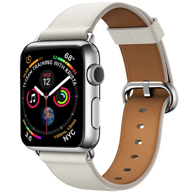 White leather watch band with silver buckle and tan underside, pin holes