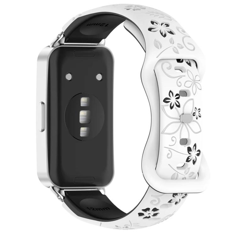 White and black floral cutout watch band with reverse buckle, attached to a smartwatch