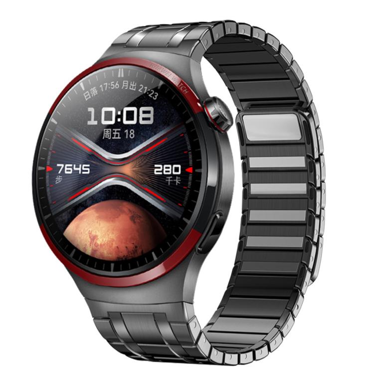 Dark gray stainless steel magnetic watch band attached to a round smartwatch