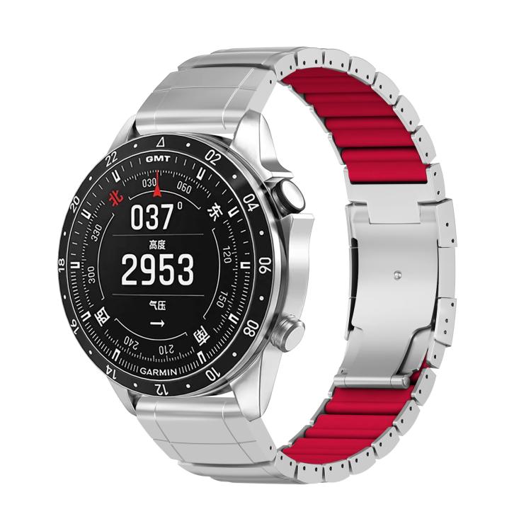 Silver watch band with red silicone inserts and folding clasp, attached to a watch.