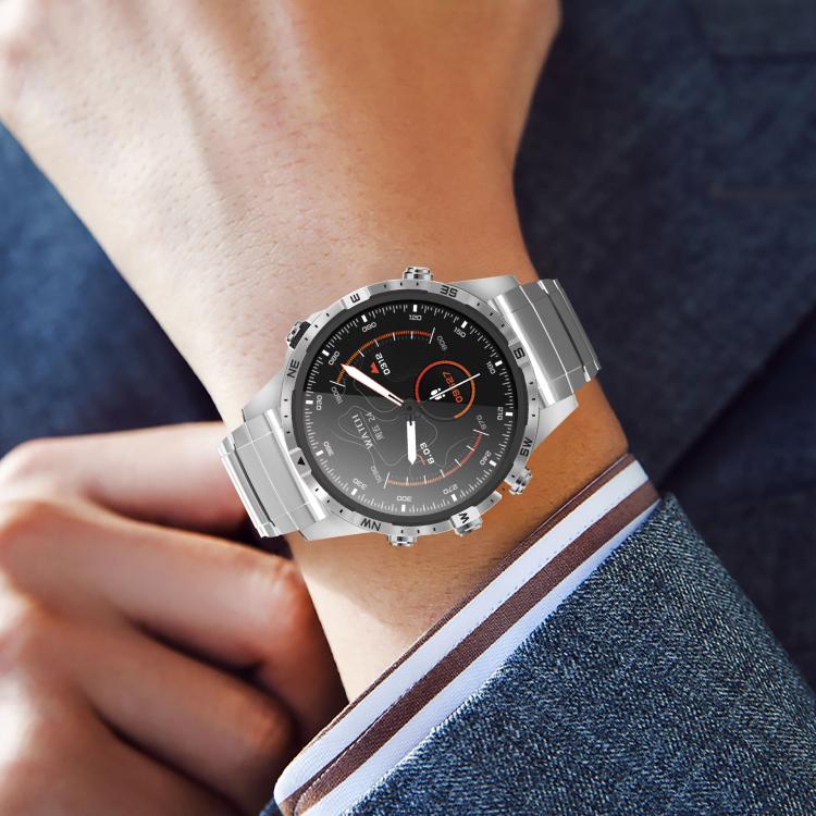 Silver watch band worn on the wrist with a Garmin watch