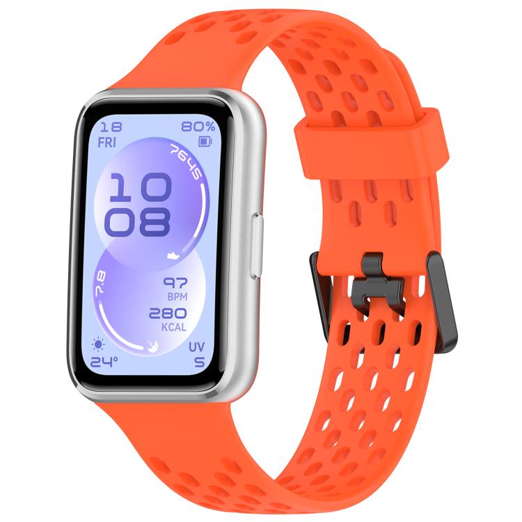 Bright orange perforated silicone watch band with dual buckle, shown on a smartwatch