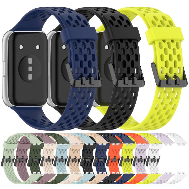 Perforated silicone watch bands in assorted colors, showing their dual-buckle closures.