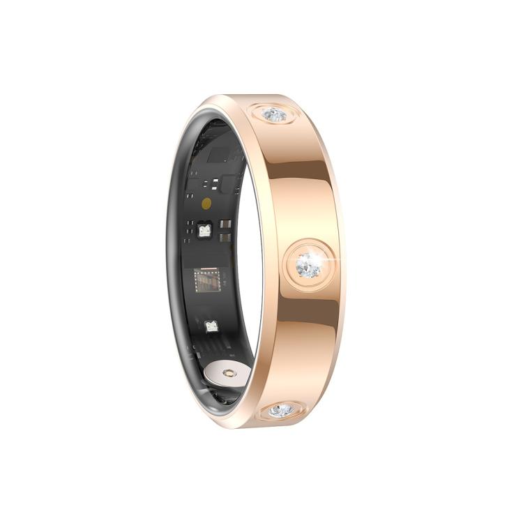 Gold smart ring with clear stones and exposed inner sensor components