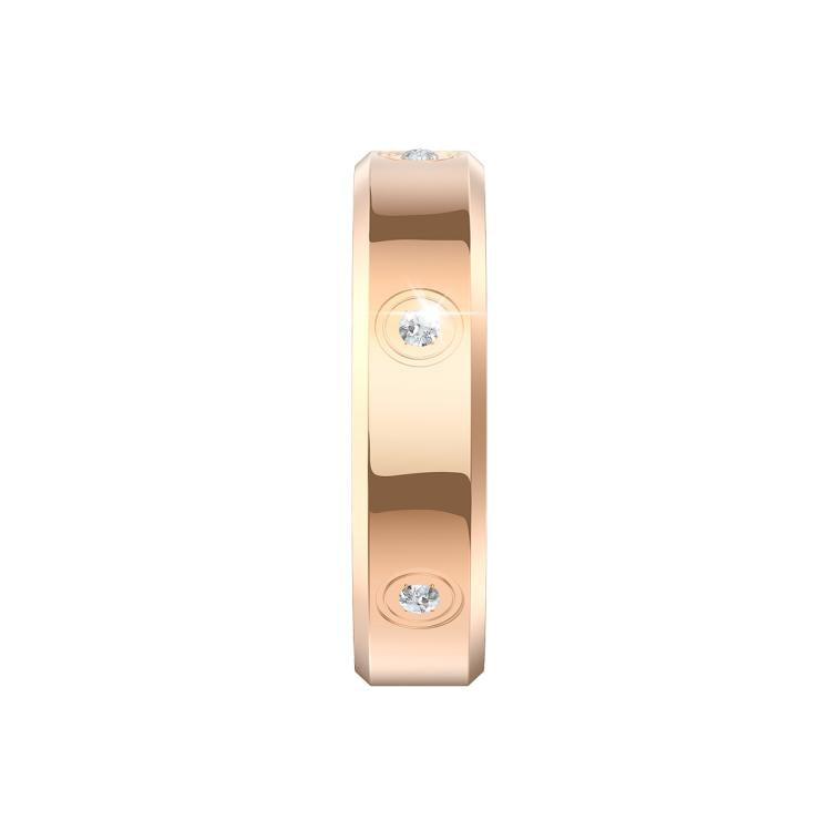 Side view of a gold smart ring with three clear stones