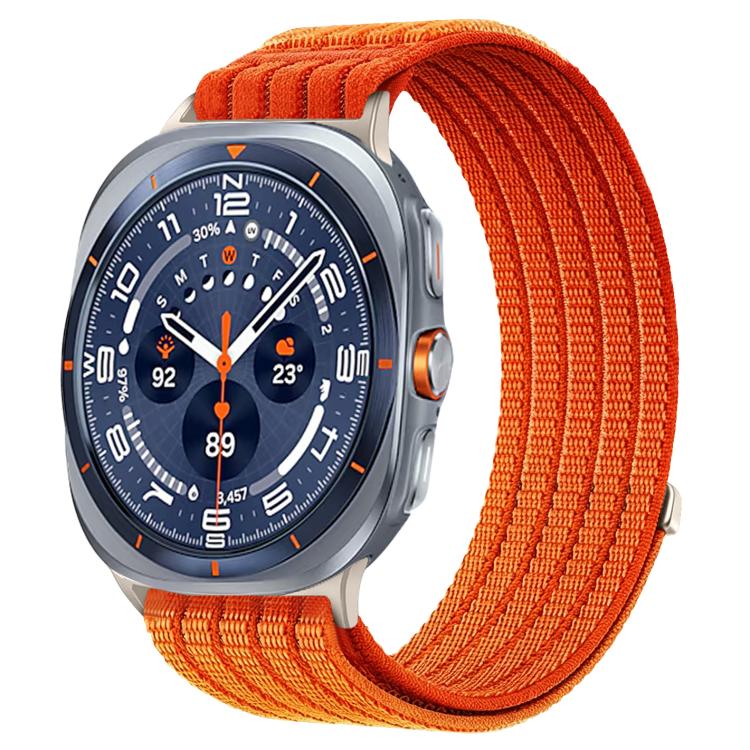 Galaxy Watch woven nylon band in bright orange, shown on a silver smartwatch