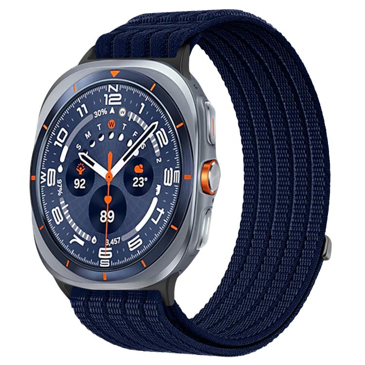 Galaxy Watch woven nylon band in dark navy blue, shown on a silver smartwatch