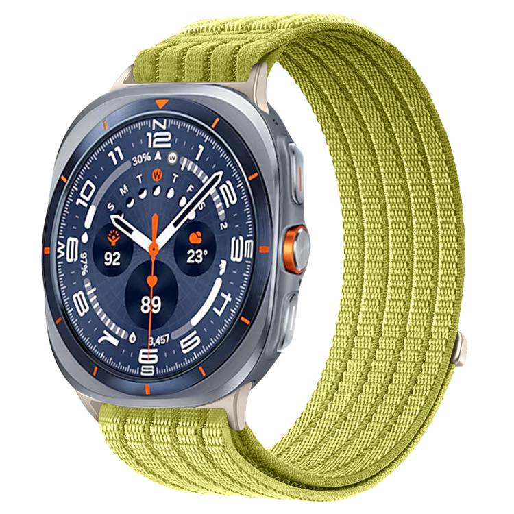 Galaxy Watch woven nylon band in lime green, shown on a silver smartwatch
