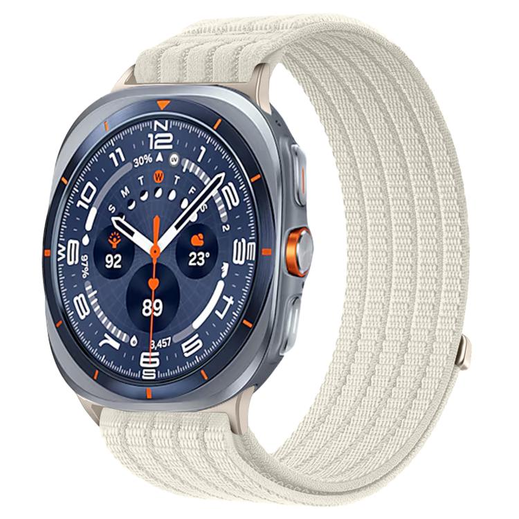 Galaxy Watch woven nylon band in off-white, shown on a silver smartwatch