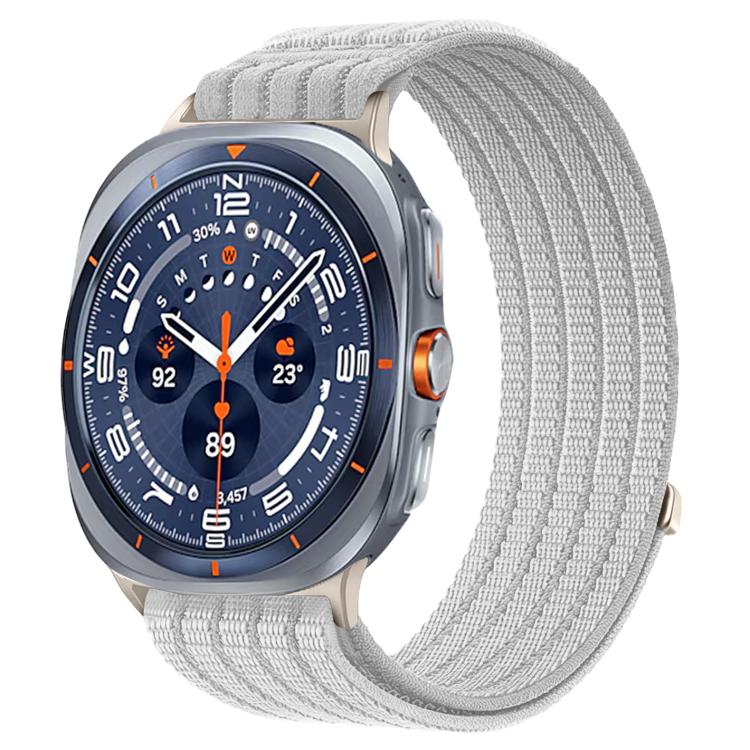Galaxy Watch woven nylon band in light gray, shown on a silver smartwatch