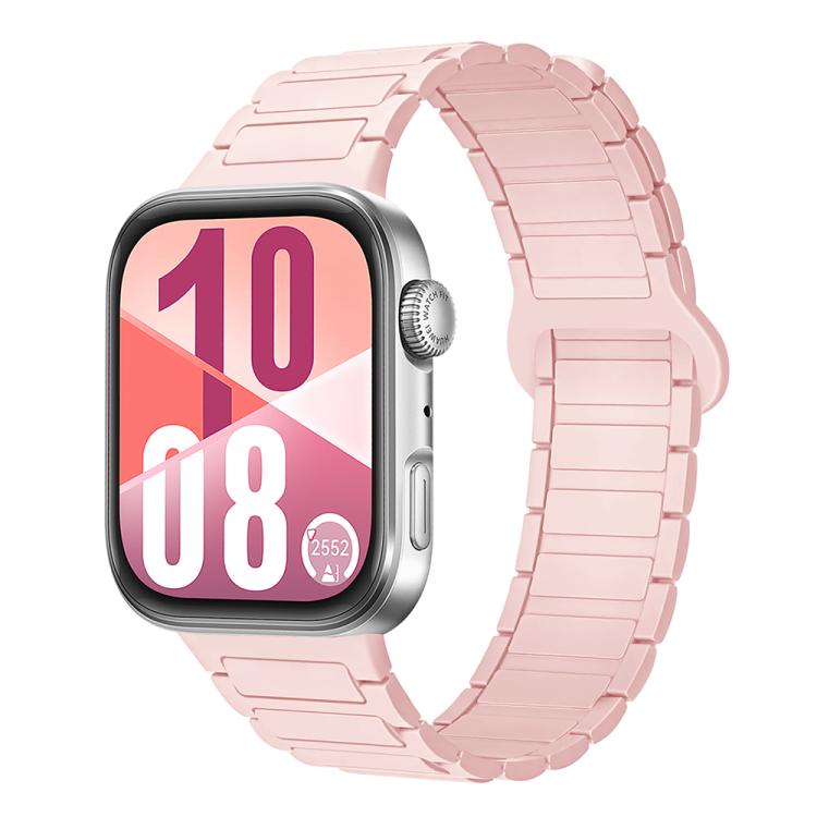 Pale pink silicone watch band with segmented links and magnetic reverse buckle