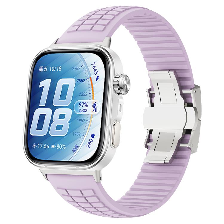 Light purple silicone watch band with knurled texture and folding buckle on a smartwatch