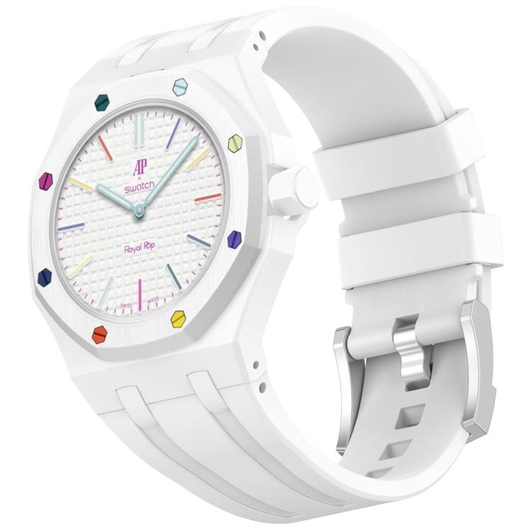 White silicone watch band with an integrated stainless steel pin buckle, fitted on a white watch.